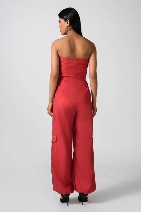 Shop Pocketful Of Cherrie Red Cotton Bandeau Neck Adventure Ready Strapless Jumpsuit at Aza Fashions Shop_Pocketful Of Cherrie_Red Cotton Bandeau Neck Adventure Ready Strapless Jumpsuit_at_Aza_Fashions