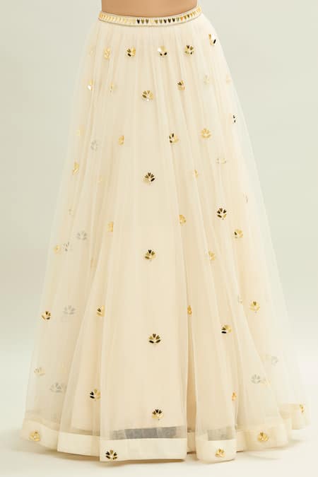 Shop_Aaryaa By Kashveen Kohli_Ivory Net Applique, Embroidery Sweetheart Neck Acrylic Lehenga Set _Online_at_Aza_Fashions