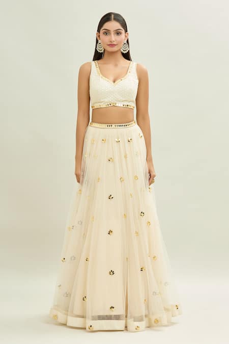 Aaryaa By Kashveen Kohli_Ivory Net Applique, Embroidery Sweetheart Neck Acrylic Lehenga Set _at_Aza_Fashions