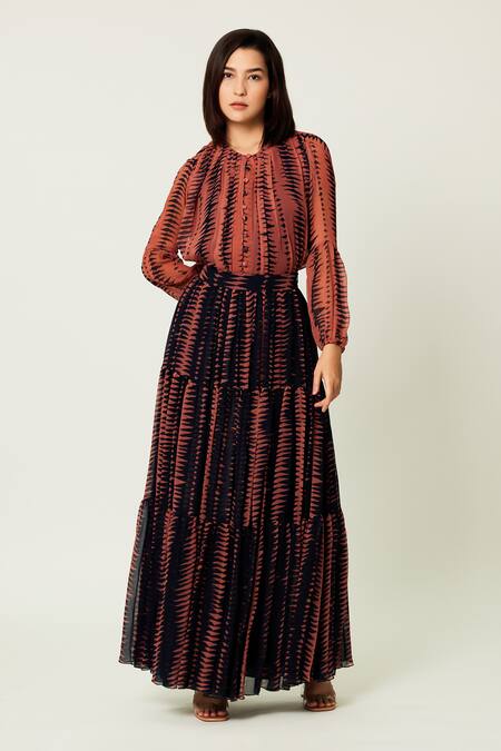 Koai_Pink Chiffon Carnival Print Tiered Maxi Skirt _Online_at_Aza_Fashions