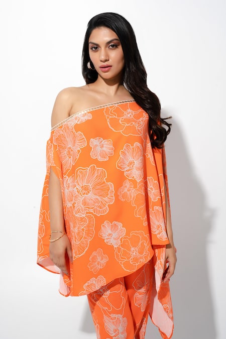 Shop Megha Pitti Orange Georgette Sequins, Beads One Floral Print Asymmetric Tunic And Pant Set at Aza Fashions Shop_Megha Pitti_Orange Georgette Sequins, Beads One Floral Print Asymmetric Tunic And Pant Set _at_Aza_Fashions