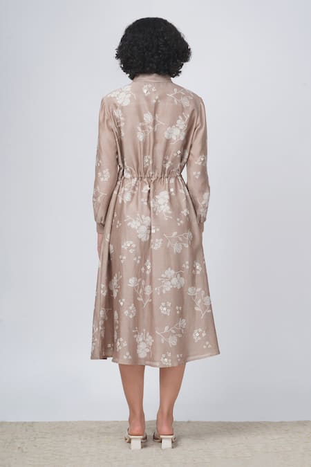 Shop Arcvsh By Pallavi Singh Beige Silk Satin Shawl Neck Yuri Floral Print Tie-up Shirt Dress at Aza Fashions Shop_Arcvsh By Pallavi Singh_Beige Silk Satin Shawl Neck Yuri Floral Print Tie-up Shirt Dress _at_Aza_Fashions