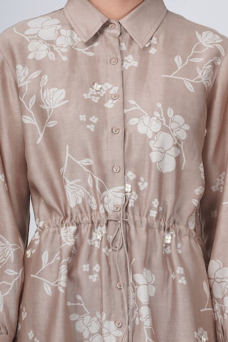 Arcvsh By Pallavi Singh Beige Silk Satin Shawl Neck Yuri Floral Print Tie-up Shirt Dress at Aza Fashions Arcvsh By Pallavi Singh_Beige Silk Satin Shawl Neck Yuri Floral Print Tie-up Shirt Dress _at_Aza_Fashions
