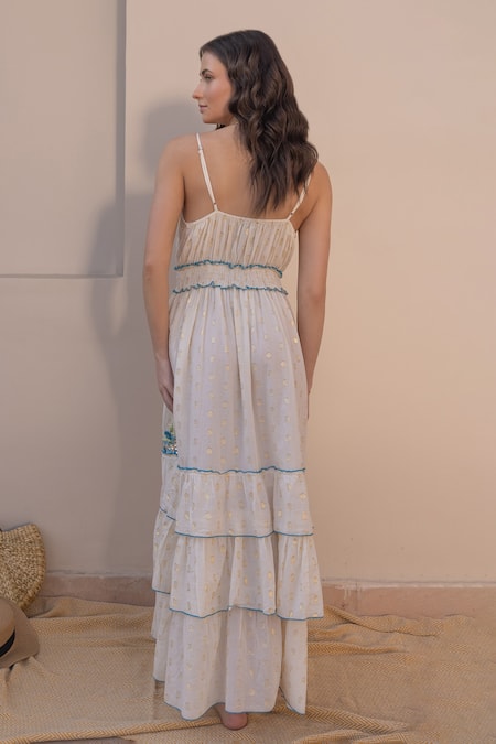 Shop Label Reyya White Cotton Embroidery, Sequins V-neck Tiered Floral Thread Gown at Aza Fashions Shop_Label Reyya_White Cotton Embroidery, Sequins V-neck Tiered Floral Thread Gown_at_Aza_Fashions