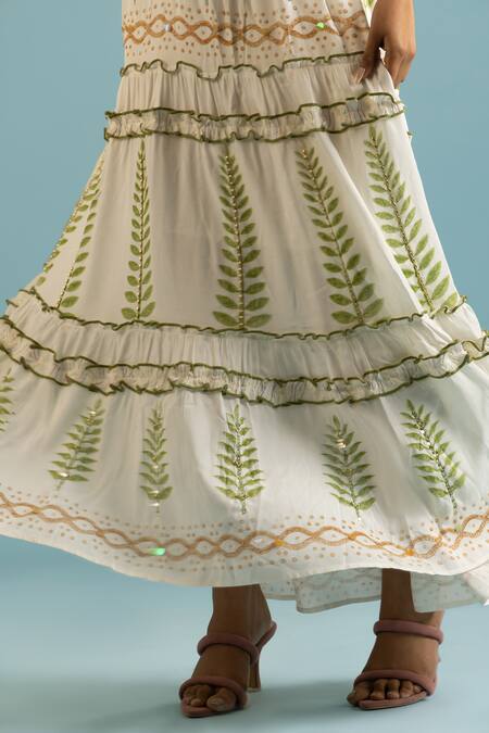 Buy Label Reyya White Cotton, Rayon Sequins, Beads V-neck Leaf Block Print Tiered Gown Online at Aza Fashions Buy_Label Reyya_White Cotton, Rayon Sequins, Beads V-neck Leaf Block Print Tiered Gown _Online_at_Aza_Fashions