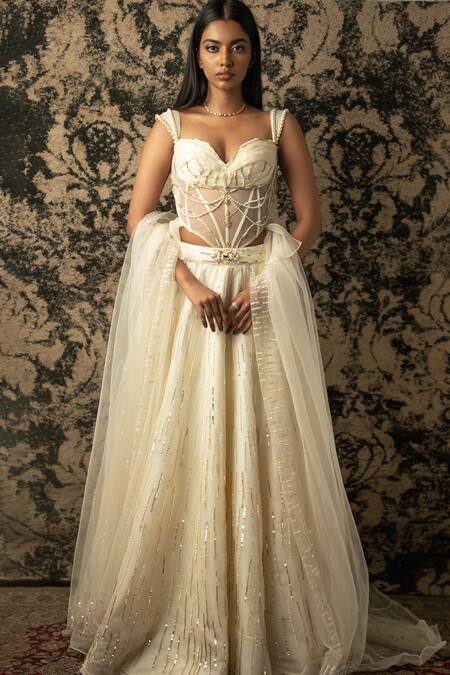 Shop_Jigar & Nikita_Ivory , Net, Silk Sequins, Cut Stripe Embroidered Lehenga Set _Online_at_Aza_Fashions
