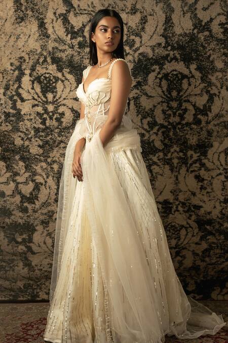Jigar & Nikita_Ivory , Net, Silk Sequins, Cut Stripe Embroidered Lehenga Set _at_Aza_Fashions