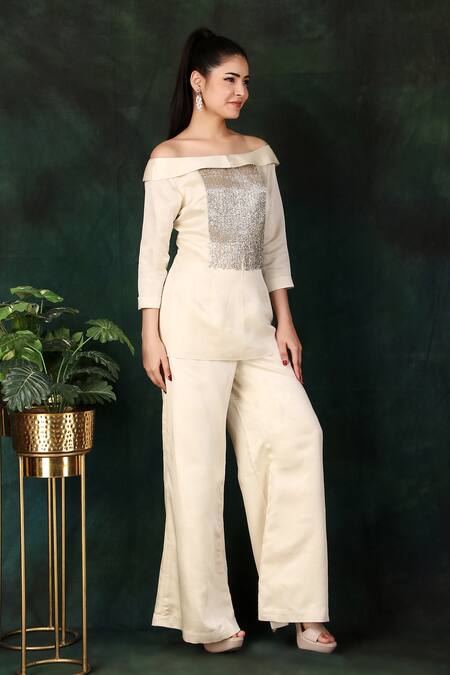 Shop_Nidhi Kejriwal_Cream Satin Cut Work, Embroidery Off-shoulder Cutdana Top And Palazzo Set _Online_at_Aza_Fashions