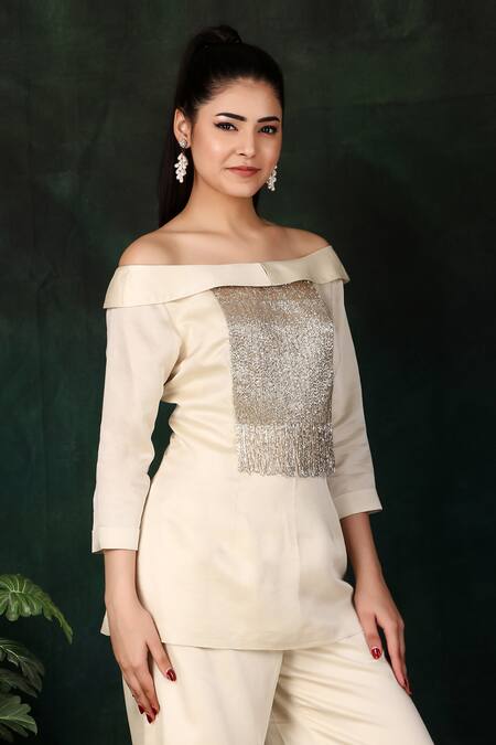 Nidhi Kejriwal_Cream Satin Cut Work, Embroidery Off-shoulder Cutdana Top And Palazzo Set _at_Aza_Fashions