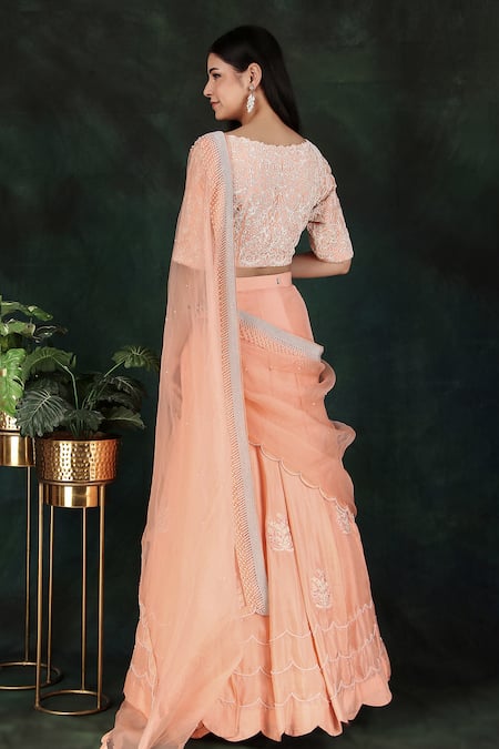 Shop Nidhi Kejriwal Peach Silk, Organza, Net Pearls Round Neck Embroidered Lehenga Saree With Blouse at Aza Fashions Shop_Nidhi Kejriwal_Peach Silk, Organza, Net Pearls Round Neck Embroidered Lehenga Saree With Blouse_at_Aza_Fashions