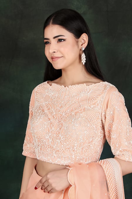 Shop Nidhi Kejriwal Peach Silk, Organza, Net Pearls Round Neck Embroidered Lehenga Saree With Blouse Online at Aza Fashions Shop_Nidhi Kejriwal_Peach Silk, Organza, Net Pearls Round Neck Embroidered Lehenga Saree With Blouse_Online_at_Aza_Fashions