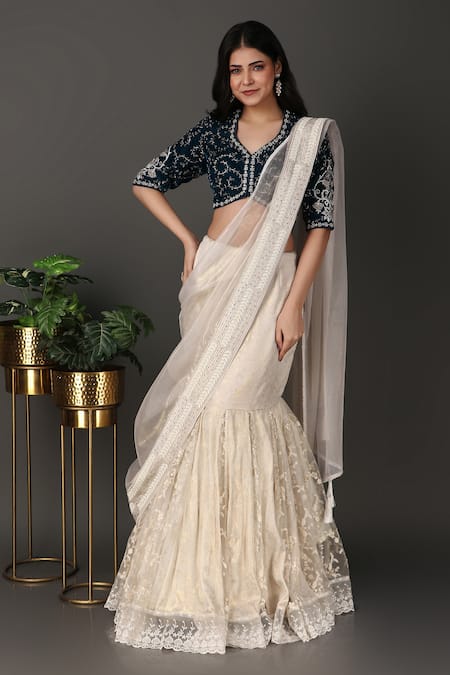 Nidhi Kejriwal Off White Net, Tissue, Velvet, Border Pre-draped Lehenga Saree With Blouse Online at Aza Fashions Nidhi Kejriwal_Off White Net, Tissue, Velvet, Border Pre-draped Lehenga Saree With Blouse _Online_at_Aza_Fashions