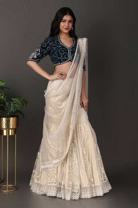 Nidhi Kejriwal Off White Net, Tissue, Velvet, Border Pre-draped Lehenga Saree With Blouse at Aza Fashions Nidhi Kejriwal_Off White Net, Tissue, Velvet, Border Pre-draped Lehenga Saree With Blouse _at_Aza_Fashions