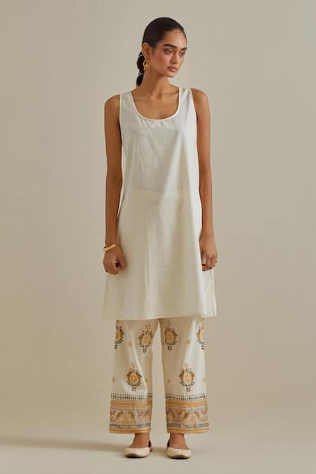 Kora Yellow Cotton Tassels, Bows Split Patchwork Embroidered A-line Kurta Pant Set Online at Aza Fashions Kora_Yellow Cotton Tassels, Bows Split Patchwork Embroidered A-line Kurta Pant Set _Online_at_Aza_Fashions