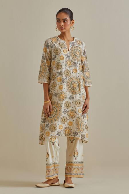 Buy Kora Yellow Cotton Tassels, Bows Split Patchwork Embroidered A-line Kurta Pant Set Online at Aza Fashions Buy_Kora_Yellow Cotton Tassels, Bows Split Patchwork Embroidered A-line Kurta Pant Set _Online_at_Aza_Fashions