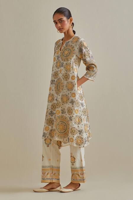 Shop Kora Yellow Cotton Tassels, Bows Split Patchwork Embroidered A-line Kurta Pant Set Online at Aza Fashions Shop_Kora_Yellow Cotton Tassels, Bows Split Patchwork Embroidered A-line Kurta Pant Set _Online_at_Aza_Fashions