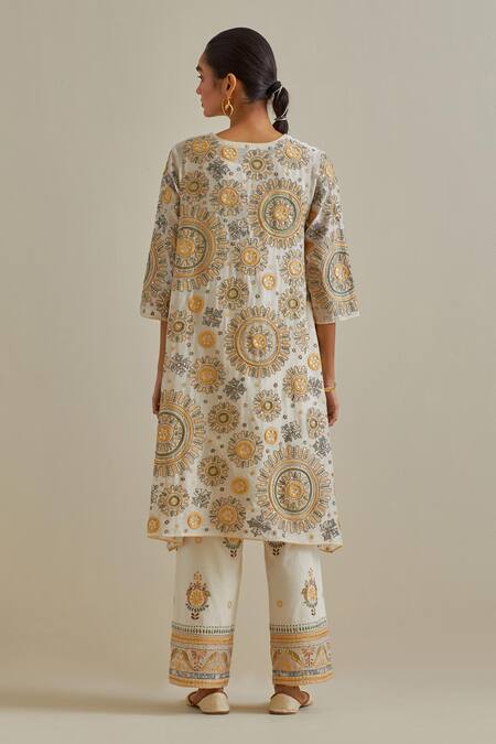 Shop Kora Yellow Cotton Tassels, Bows Split Patchwork Embroidered A-line Kurta Pant Set at Aza Fashions Shop_Kora_Yellow Cotton Tassels, Bows Split Patchwork Embroidered A-line Kurta Pant Set _at_Aza_Fashions