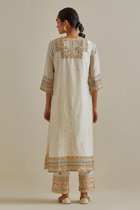 Shop Kora Yellow Cotton, Chanderi Embroidery, Sequins, Tassels, Mirrors Split Kurta Set at Aza Fashions Shop_Kora_Yellow Cotton, Chanderi Embroidery, Sequins, Tassels, Mirrors Split Kurta Set _at_Aza_Fashions