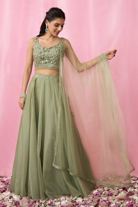 Aariyana Couture_Green Net, Organza Sequins, Cut Work Sweetheart Neck Embroidered Lehenga Set _Online_at_Aza_Fashions