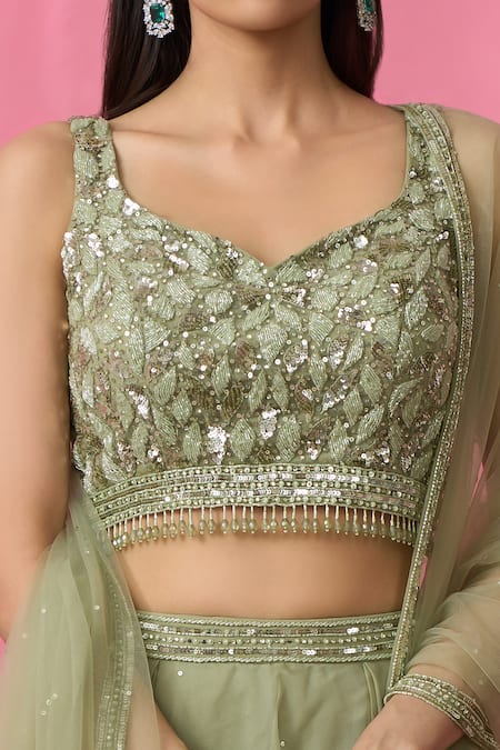 Shop_Aariyana Couture_Green Net, Organza Sequins, Cut Work Sweetheart Neck Embroidered Lehenga Set _Online_at_Aza_Fashions