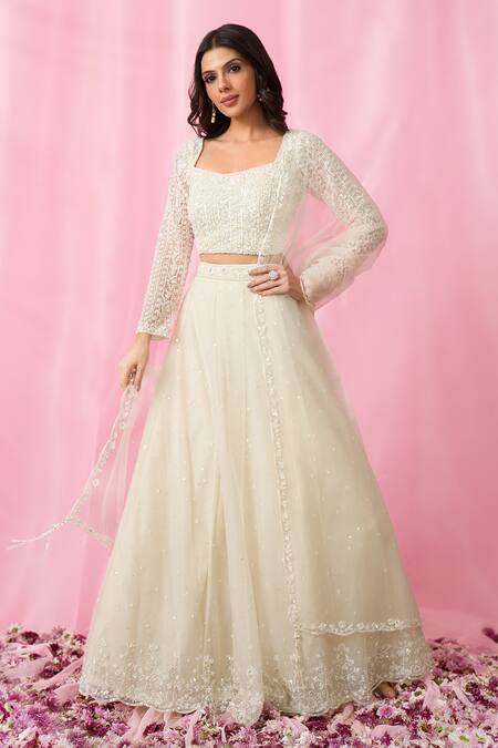 Aariyana Couture_Ivory Net, Organza Cut Work, Pearls, Sequins, Hand Embroidered Lehenga Set _at_Aza_Fashions