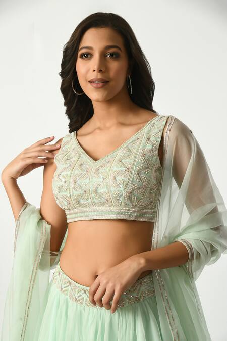 Salt And Spring Green Organza, Polyester Sequins, Beads Geometric Embellished Blouse Lehenga Set at Aza Fashions Salt And Spring_Green Organza, Polyester Sequins, Beads Geometric Embellished Blouse Lehenga Set _at_Aza_Fashions