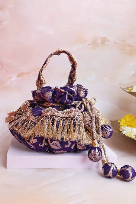 Shop Soho Boho Studio By Aarti Thakur Purple Floral Banarasi Woven Potli at Aza Fashions Shop_Soho Boho Studio By Aarti Thakur_Purple Floral Banarasi Woven Potli_at_Aza_Fashions