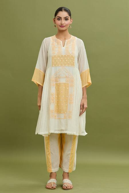 Jyoti Bansal_Yellow Chanderi, Cotton, Kota Doria Embroidery Split V-neck Floral Kurta Set _Online_at_Aza_Fashions