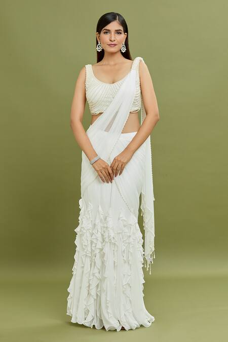 Arpan Vohra_Ivory Georgette Pearls, Tassels Plunge Frill Ruffle Pre-draped Saree With Blouse _Online_at_Aza_Fashions