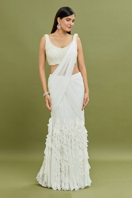 Buy_Arpan Vohra_Ivory Georgette Pearls, Tassels Plunge Frill Ruffle Pre-draped Saree With Blouse _Online_at_Aza_Fashions