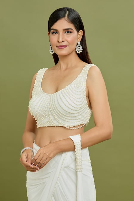 Arpan Vohra_Ivory Georgette Pearls, Tassels Plunge Frill Ruffle Pre-draped Saree With Blouse _at_Aza_Fashions
