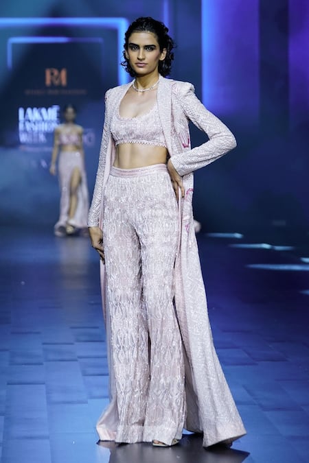 Shop Ritika Mirchandani Pink Net Embroidery Crystal Trench Coat Collar And Flared Pant Set at Aza Fashions Shop_Ritika Mirchandani_Pink Net Embroidery Crystal Trench Coat Collar And Flared Pant Set _at_Aza_Fashions