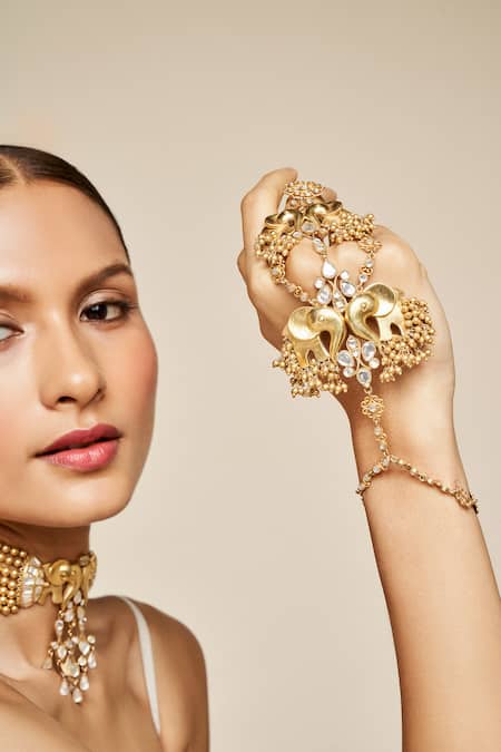 Buy Anita Dongre Gold Plated Zari, Pearls Haathi Carved Haathphool - Single Pc Online at Aza Fashions Buy_Anita Dongre_Gold Plated Zari, Pearls Haathi Carved Haathphool - Single Pc_Online_at_Aza_Fashions