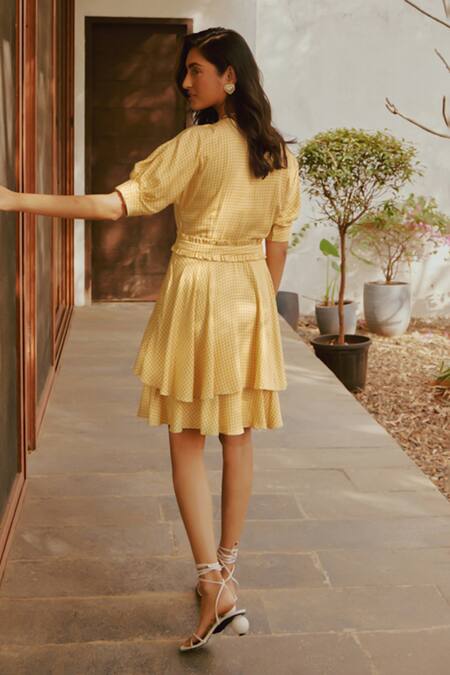 Shop Tara And I Yellow Modal Ruffles V-neck Hounstooth Print Tiered Dress at Aza Fashions Shop_Tara And I_Yellow Modal Ruffles V-neck Hounstooth Print Tiered Dress_at_Aza_Fashions