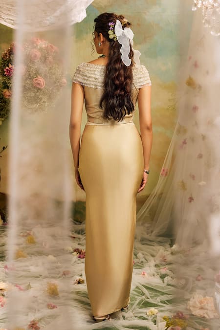 Shop Studio22 By Pulkita Arora Bajaj Gold Tissue, Satin Embroidery, Tassels V-neck Blouse And Pleated Skirt Set at Aza Fashions Shop_Studio22 By Pulkita Arora Bajaj_Gold Tissue, Satin Embroidery, Tassels V-neck Blouse And Pleated Skirt Set _at_Aza_Fashions