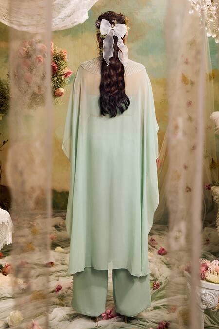 Shop Studio22 By Pulkita Arora Bajaj Blue Georgette Tassels, Cut Work V-neck Cutdana And Embroidered Kaftan Pant Set at Aza Fashions Shop_Studio22 By Pulkita Arora Bajaj_Blue Georgette Tassels, Cut Work V-neck Cutdana And Embroidered Kaftan Pant Set _at_Aza_Fashions