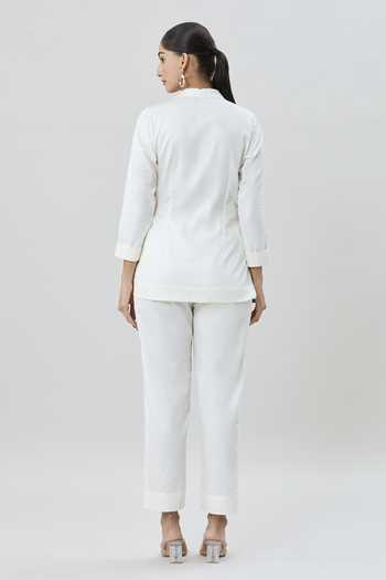 Shop Samyukta Singhania Off White Cotton Satin Embroidery Collared Block Print Wrap Top And Pant Set at Aza Fashions Shop_Samyukta Singhania_Off White Cotton Satin Embroidery Collared Block Print Wrap Top And Pant Set_at_Aza_Fashions