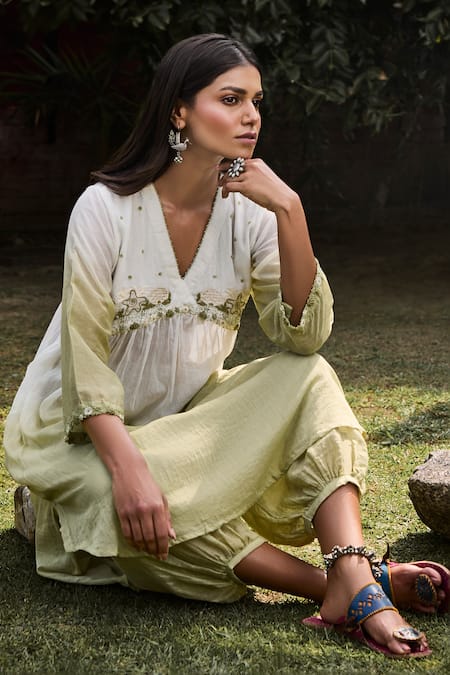 Shop Vaani Beswal Ivory Handloom Cotton Embroidery V-neck Nori Yoke Hand Tunic And Salwar Set at Aza Fashions Shop_Vaani Beswal_Ivory Handloom Cotton Embroidery V-neck Nori Yoke Hand Tunic And Salwar Set _at_Aza_Fashions