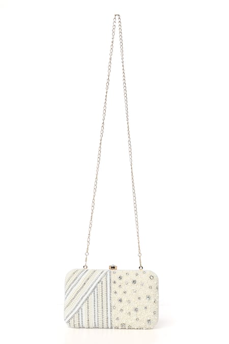 Shop House Of Webhin White Pearls, Studs Luxe Embellished Clutch With Detachable Sling Chain at Aza Fashions Shop_House Of Webhin_White Pearls, Studs Luxe Embellished Clutch With Detachable Sling Chain _at_Aza_Fashions
