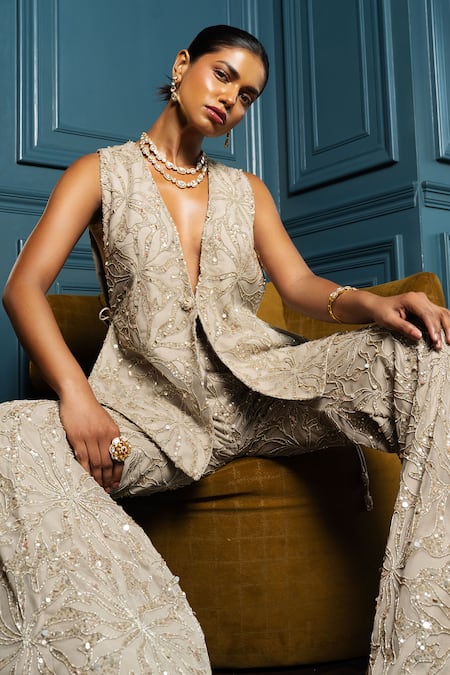 Charu And Vasundhara_Gold Net Cut Work, Sequins V-neck Venice Floral Embroidered Jacket Pant Set _at_Aza_Fashions