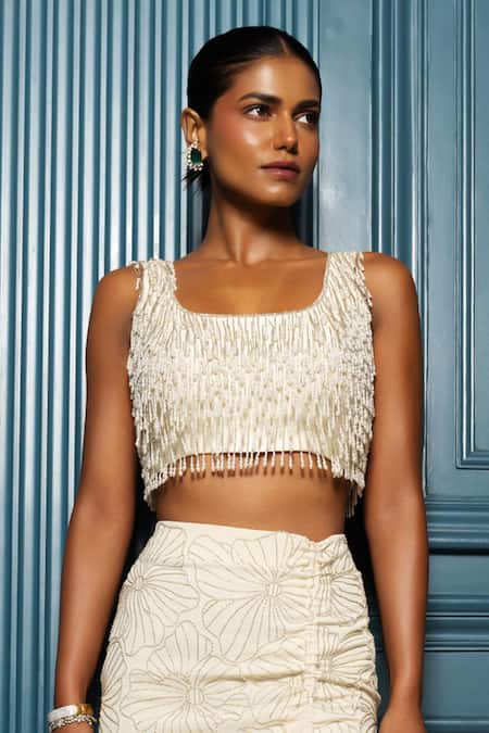 Shop Charu And Vasundhara Ivory Silk, Georgette Valoire Floral Embellished Skirt With Tasselled Blouse Online at Aza Fashions Shop_Charu And Vasundhara_Ivory Silk, Georgette Valoire Floral Embellished Skirt With Tasselled Blouse _Online_at_Aza_Fashions