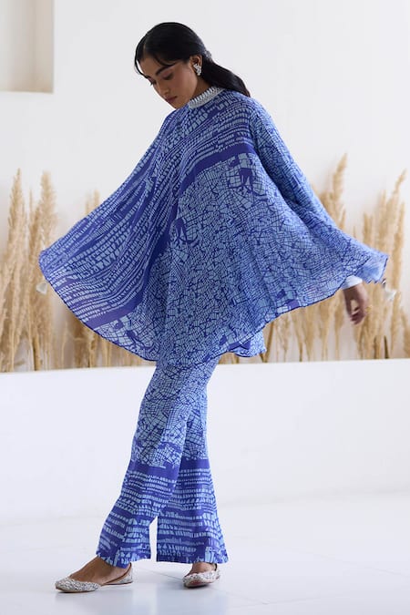 Inej_Blue Cotton, Silk Tassels, Abstract Print Draped Top And Bell Bottom Pant Set _at_Aza_Fashions