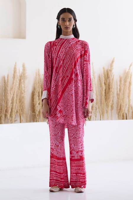 Inej Red Cotton, Silk Tassels, Metallic Printed Draped Top And Bell Bottom Pant Set Online at Aza Fashions Inej_Red Cotton, Silk Tassels, Metallic Printed Draped Top And Bell Bottom Pant Set _Online_at_Aza_Fashions