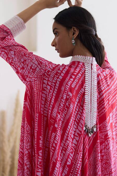 Inej Red Cotton, Silk Tassels, Metallic Printed Draped Top And Bell Bottom Pant Set at Aza Fashions Inej_Red Cotton, Silk Tassels, Metallic Printed Draped Top And Bell Bottom Pant Set _at_Aza_Fashions