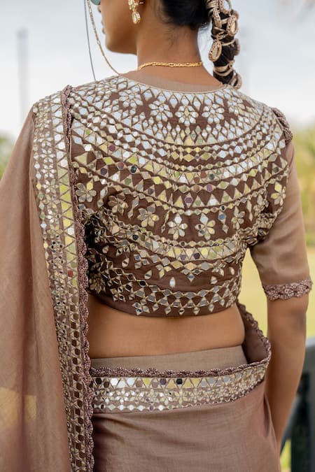 Nikita Vishakha_Brown Silk, Tissue Mirrors Round Neck Embroidered Hem Saree With Blouse _at_Aza_Fashions