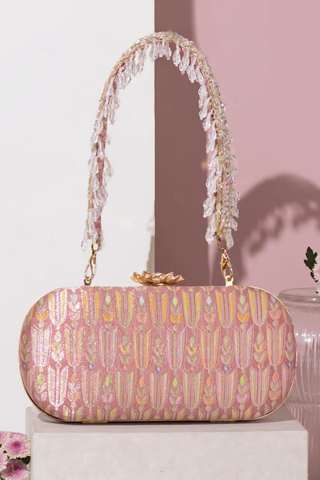 Shop Amyra Pink Embroidery, Tassels Titli Blossom Banarasi Silk Capsule Clutch at Aza Fashions Shop_Amyra_Pink Embroidery, Tassels Titli Blossom Banarasi Silk Capsule Clutch_at_Aza_Fashions