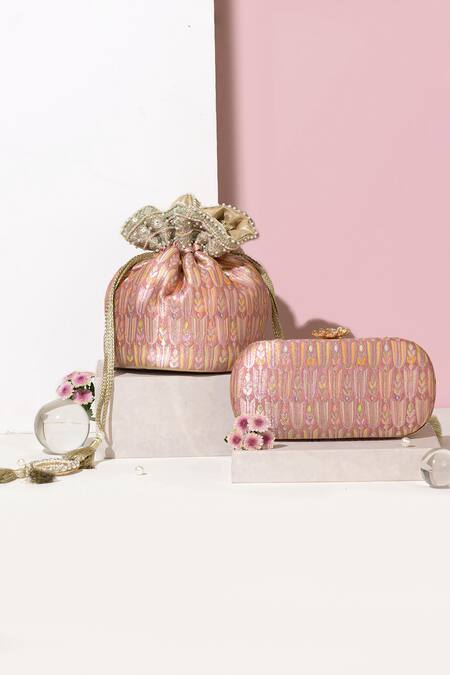 Amyra Pink Embroidery, Tassels Titli Blossom Banarasi Silk Capsule Clutch at Aza Fashions Amyra_Pink Embroidery, Tassels Titli Blossom Banarasi Silk Capsule Clutch_at_Aza_Fashions