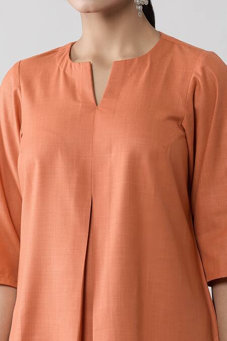 Shop Naintara Bajaj Peach Keyhole Neck Pleated Top And Solid Pant Co-ord Set Online at Aza Fashions Shop_Naintara Bajaj_Peach Keyhole Neck Pleated Top And Solid Pant Co-ord Set _Online_at_Aza_Fashions