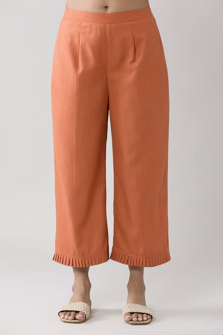 Naintara Bajaj Peach Keyhole Neck Pleated Top And Solid Pant Co-ord Set at Aza Fashions Naintara Bajaj_Peach Keyhole Neck Pleated Top And Solid Pant Co-ord Set _at_Aza_Fashions