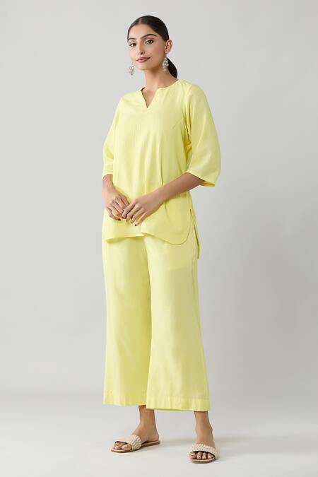 Buy Naintara Bajaj Yellow Cotton Keyhole Neck Pintucked Top And Pant Co-ord Set Online at Aza Fashions Buy_Naintara Bajaj_Yellow Cotton Keyhole Neck Pintucked Top And Pant Co-ord Set _Online_at_Aza_Fashions